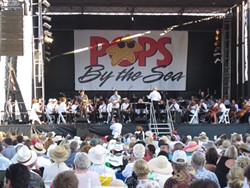 DIG THE SCENE! :  Pops by the Sea attendees can spring for VIP seating at chairs or tables, or bring a low backed chair or blanket and grab some grass. This shot is from a couple years ago when the Damon Castillo Band performed. - PHOTO COURTESY OF THE SLO SYMPHONY