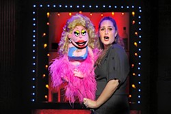 MAN&rsquo;S BEST FRIEND :  Lucy the Slut, manned by Jacqueline Grabois, bed hops through the fictional neighborhood of Avenue Q. - PHOTO COURTESY OF AVENUE Q