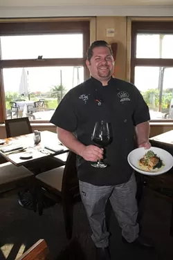 ON THE MENU: Lido chef Jacob Moss, a local wine aficionado, presents his apple and chorizo stuffed sole with braised kale, celery root latke, and apple - cider beurre blanc. - PHOTO BY DAN HARDESTY