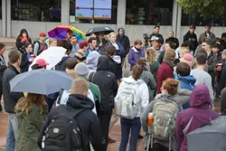 STAND IN SOLIDARITY: Cal Poly students congregated at University Union plaza on Nov. 15 to rally against offensive comments written on a “free speech wall.” Students discussed the lack of diversity at Cal Poly and their experiences with discrimination and belonging on campus. - PHOTO BY DYLAN HONEA-BAUMANN