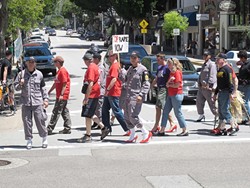 STRUTTING THEIR STUFF :  There were 150 registered walkers at this year's Walk a Mile in Her Shoes event. Proceeds were split between the SARP Center and the SLO Symphony. - PHOTO COURTESY OF MEGAN MASTACHE
