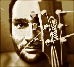 QUITE THE SHOWMAN: Catch Julian Temple’s rambunctious live show on Dec. 27 at Kreuzberg Café in downtown SLO. He’s the featured artist at a Songwriters at Play showcase. - PHOTO COURTESY OF JULIAN TEMPLE