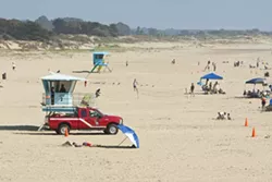 OUTSOURCED: Pismo Beach pays San Luis Obispo County to provide fire service and enforce its burning laws on its beachfront, which the city leases from the State of California. - PHOTO BY STEVE E. MILLER