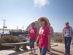 STROLLING THE EMBARCADERO: Participants in the Food Bank’s annual Hunger Walk make their way from Morro Rock to the finish line, raising money and awareness for individuals in San Luis Obispo County suffering from hunger. - PHOTO COURTESY OF TERHOST PRODUCTIONS