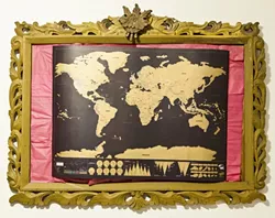 GOING PLACES: Executive Editor Ryan Miller gave me this scratch map to help keep track of my travels. - PHOTO BY COLIN RIGLEY
