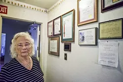 WOMAN OF THE YEAR: With a wall covered in certificates and plaques of recognition for her work with sick children, Sjany de Groot has - received commendations from state officials, as well as late-President Ronald Reagan. - PHOTO BY COLIN RIGLEY