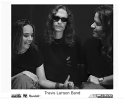 SHREDDIN’ IT UP : The Travis Larson Band adds their progressive rock fusion to Ho Ho Hoey’s Rockin’ Holiday Show at SLO Brew on Dec. 9. - PHOTO COURTESY OF THE TRAVIS LARSON BAND