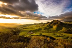 MARVELOUS MORROS: This photo, taken from Cerro San Luis and looking west toward Morro Bay, shows most of the Nine Sisters in the chain of peaks. - PHOTO BY KAORI FUNAHASHI