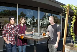 PERFECT PITCHER : The Molly Pitcher staff of Kendall Bryson, Rachel Bryson, and Brian Vogel (left to right) contemplate an afternoon off on their brewery’s patio. - PHOTO BY STEVE E. MILLER