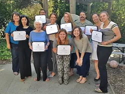 CERTIFIED COUNSELORS: Volunteers at the Women’s Shelter Program of SLO County pose for a photo with their domestic violence counselor certificates. The shelter is looking for volunteers to take part in an upcoming training program that starts on Dec. 9. Volunteers are critical to the 24/7 operation of the shelter. - PHOTO COURTESY OF THE WOMEN’S SHELTER PROGRAM OF SLO COUNTY