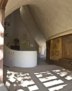 THE SHELL OF A HOUSE: Third-year history major Ryan Kadlec analyzes Cal Poly's “Shell House”—vandalized by some, treasured by others—as an example of the changing reactions to public art. - PHOTO BY STEVE E. MILLER