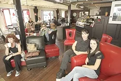 CUPPA JOE : Customers at Amsterdam relax with quality espresso and baked goods, fulfilling a longtime dream of the café’s mother and daughter owners, Rosemary and Stephanie Bourgault (far right). - PHOTO BY STEVE E. MILLER