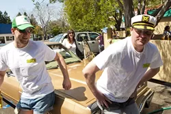 SHAM-WOW! : Dan and Patrick put the finishing … um, touches on a newly washed car. - PHOTO BY STEVE E. MILLER