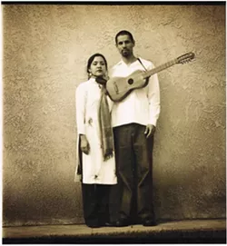 POWER COUPLE : Quetzal Flores, founder of Quetzal, plays guitar for the musical ensemble and his wife Martha Gonzalez is the lead vocalist and percussionist for the group - PHOTO COURTESY OF QUETZAL