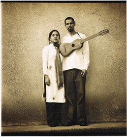 POWER COUPLE :  Quetzal Flores, founder of Quetzal, plays guitar for the musical ensemble and his wife Martha Gonzalez is the lead vocalist and percussionist for the group - PHOTO COURTESY OF QUETZAL