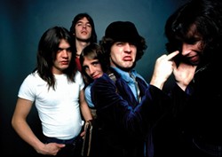 THE REAL MCCOY! :  Highway to Hell-era AC/DC members included Malcolm Young, Cliff Williams, Phil Rudd, Angus Young, and Bon Scott. - PHOTO COURTESY OF AC/DC