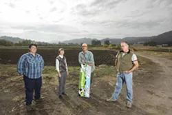 MEMBERS IN GOOD STANDING : Several key members of the Huasna Valley Association-—(left to right) Anna Gabriel, Lyn Schultz, Ron Skinner, and Doug Timewell— take time for a breath of fresh air. - PHOTO BY STEVE E. MILLER