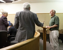 OF OUR ELABORATE PLANS, THE END :  Peter Miller [right]&mdash;last of the so-called &ldquo;Doobie Dozen&rdquo; is offered a congratulatory handshake from his attorney, David Fisher, as Deputy District Attorney Sandy Mitchell [left] looks on. - PHOTO BY STEVE E. MILLER