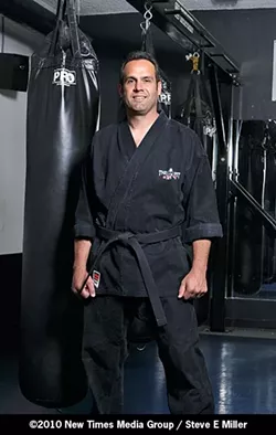 KUNG FU FIGHTING : San Luis Obispo Police Captain Ian Parkinson has been working out at The Pit for years. - PHOTO BY STEVE E. MILLER