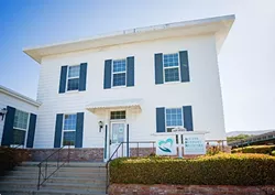 SHOESTRING: The Access Support Network provides services to HIV-positive clients in the county, but when it comes to prevention, the budget is stretched thin. - PHOTO BY KAORI FUNAHASHI
