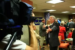 LIGHTS, CAMERA … : Despite a losing night, Ed Waage entertained TV reporters during an interview. - PHOTO BY COLIN RIGLEY