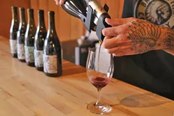 CRAFT CORKS : Orion Stang of Dilecta Wines uses artwork created by his mother to create a one-of-a-kind label that makes you look twice. His fruit is sourced from Paso Robles to Santa Barbara, and the wines span artfully crafted blends to vineyard-designated syrah. - PHOTO BY DYLAN HONEA-BAUMANN