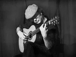 GARDEN GUITARIST : Local vocalist Deanna Delore joins classical guitar guru James Edwards (pictured) for an outdoor concert on Sept. 19 at the SLO Botanical Garden Amphitheatre. - PHOTO COURTESY OF JAMES EDWARDS