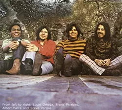 YESTERDAY AND TODAY : (Left) Louie Ortega and bandmates Frank Paredes, Albert Parra, and Steve Vargas as they appeared as Louie and the Lovers, circa 1969, and (right) Louie with Texas Tornados bandmate Michael Guerra when they played Lincoln Center last month. See Louie play solo at Cambria Pines Lodge on Dec. 1, The Cliffs on Dec. 4, the Carlton (as a duo) on Dec. 5, and Las Cambritas on Dec. 6. - PHOTOS COURTESY OF LOUIE ORTEGA