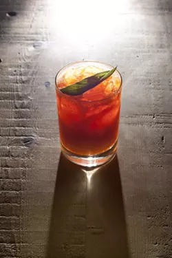 CARROT AND LIME?: Believe it or not, it works! Mix in sage, allspice syrup, and Death’s Door gin, and you’ve got The Drunken Gardener, one of Granada Bistro’s most popular original creations. - PHOTO BY STEVE E. MILLER