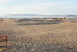 SAND STORM : In response to a study linking off-road vehicle use to pollution on the Nipomo Mesa and elevated public health concerns, SLO County supervisors have urged the State Parks’ Off-Highway Motor Vehicle Division to scrutinize the Oceano Dunes. - FILE PHOTO BY STEVE E. MILLER