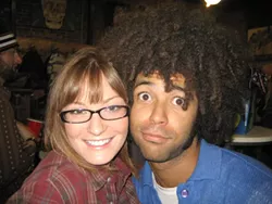 HAPPY LOVIN’ COUPLE : Name-savant Nicole Smith and her tardy artist boyfriend Cory Anderson mug for the camera at the Nov. 6 SLO Skatepark silent auction fundraiser at Coalition skate shop. - PHOTO BY GLEN STARKEY