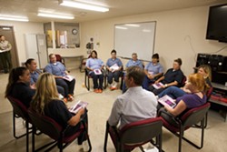 GROUP THERAPY :  Nonviolent inmates at the SLO County Jail&rsquo;s Women&rsquo;s Honor Farm participate in cognitive-behavioral therapy, one in a list of behavioral, drug and alcohol, and vocational programs now available in local jails following the passage of AB109, commonly known as realignment. - PHOTO BY STEVE E. MILLER
