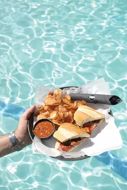 FIND SERENITY: at the Lido Restaurant’s fireside grill by the pool by the sea - PHOTO BY STEVE E. MILLER