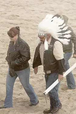 ON THE WAR PATH : One Indian motorcycle enthusiast donned a chief’s headdress. - PHOTO BY STEVE E. MILLER