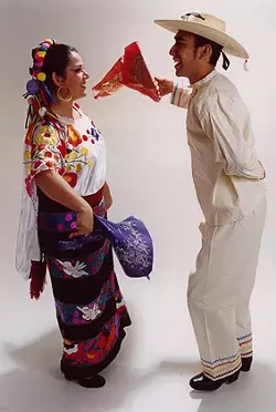 COLOR AND DANCE : Horacio Heredia and Lela Gabaldon perform a dance from Veracruz, Mexico. - PHOTO BY OCTAVIO BARBA