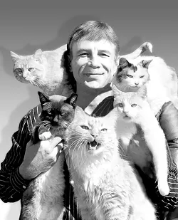 ONE BIG FLUFFY FAMILY : Gregory Popovich adopts all of his furry performers from animal shelters and regards them as family. This picture was originally titled “Popovich and kids.” - PHOTO COURTESY OF COMEDY PET THEATER