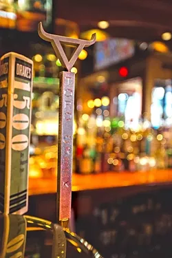 ON TAP: Enjoy Toro Creek Brewing Co.’s beer in select SLO County bars, like here at Mother’s Tavern. - PHOTO BY KAORI FUNAHASHI