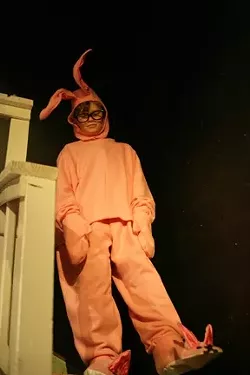 THE HORRIBLE GIFT!: Ralphie (Christopher Jensen) bear his shame as he has to model the dreaded bunny PJs outfit. - PHOTO BY GLEN STARKEY