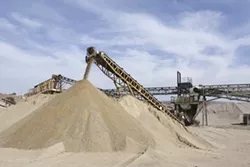 SAND CASTLES : Opponents of mining sand from the riverbed near San Miguel point to the extensive supplies already available at Union Asphalt’s non-riverbed sand mine a few miles away in Monterey County. - PHOTO BY STEVE E. MILLER