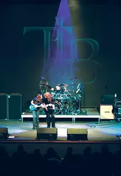 WE WHO ARE ABOUT TO ROCK, SALUTE YOU : Prog-rock heroes The Travis Larson Band will promote their new live CD and DVD Rate of Change with a May 30 in-store at Boo Boo Records and a June 4 concert at Frog and Peach. - PHOTO COURTESY OF TRAVIS LARSON BAND