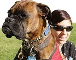 AT THE HIP : Sachi Bobge, 21, takes her dog Koda everywhere for emotional support. - PHOTO BY STEVE E. MILLER