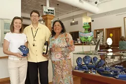 LOVE IS IN THE AIR : Ken and Kris Siegal (left) stand with Maria Goldman in this newly opened wine bar and jewelry store. - PHOTO CREDITS STEVE E. MILLER
