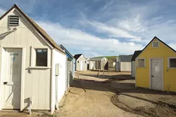 TRAGEDY AT DAYCARE FOR DOGS : Thousand Hills Pet Resort consists of 28 individual dog house structures, and more than a dozen play yards. The structures have electricity, which may have sparked the fire that recently killed seven dogs. - FILE PHOTO FROM FEBRUARY 2010 BY STEVE E. MILLER