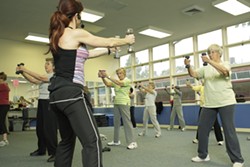 THIN LIZZIE :  San Luis Coastal Unified School District offers strength training, body conditioning, aerobic, and flexibility classes at 1500 Lizzie St. in SLO, such as this one led by Michele Vanderlinde. - PHOTO BY STEVE E. MILLER