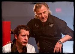 YOU MUST BE NUTS : Jason Jones, of Daily Show fame, plays a failed boxer known as “Nuts” because of his opponent’s seemingly coincidental tendencies to kick him there. Harvey Keitel, right, plays his boxing match-rigging father, Duke White. - PHOTO COURTESY OF DARIUS FILMS