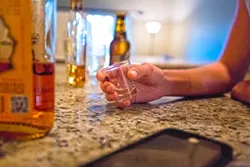 CHECK YOURSELF: Sex and drinking go together like peanut butter and jelly, or so it seems, but sometimes they shouldn’t. In fact, legally, a person under the influence of a substance can’t give consent. In the case of a somewhat blurry sexual assault case: Cal Poly’s Title IX Office asks a number of questions about the victim’s ability to give consent: How drunk was that person? Were they slurring their words? Could they stand up? Would a reasonable-thinking person have felt that person had the ability to give consent? The onus for getting that consent falls on the alleged perpetrator. - PHOTO BY KAORI FUNAHASHI