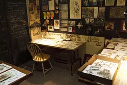 THE ARTIST’S SANCTUARY : Pictured is Kroll’s studio, which contains endless drawers of things she’s cut out, which now await use in future projects.