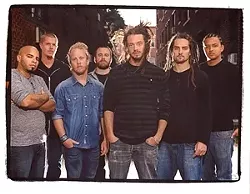 SOJA SOUNDS : (Left to right) Rafael Rodriguez, Patrick O’Shea, Bobby Lee Jefferson, Ken Brownell, Jacob Hemphill, Ryan Berty, and Hellman Escorcia are SOJA, playing May 27 at Pozo Saloon. - PHOTO BY SAM ERICKSON