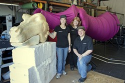 DRAGON IN PROGRESS :  MJ Johnson, Jessi Brown, and Robyn Burns from Ethereal FX are pictured with their 32-foot dragon puppet in the making. When finished, the puppet will weigh 75 pounds and take six actors to operate. - PHOTO BY STEVE E. MILLER