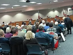 HOT TICKET: A crowd watches as the Atascadero City Council, acting as a redevelopment agency, pledges $1.5 million for a downtown theater project. - PHOTO BY COLIN RIGLEY